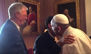 Homosexual_married_greeting_Francis.jpg